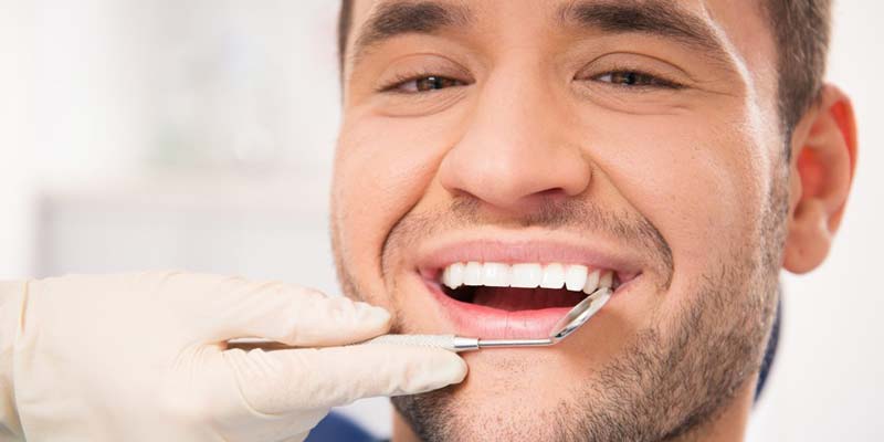 Dental Exam Male Getting Dental Oral Cancer Check
