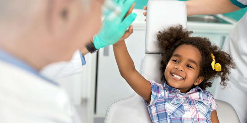 Child at Dentist High Five